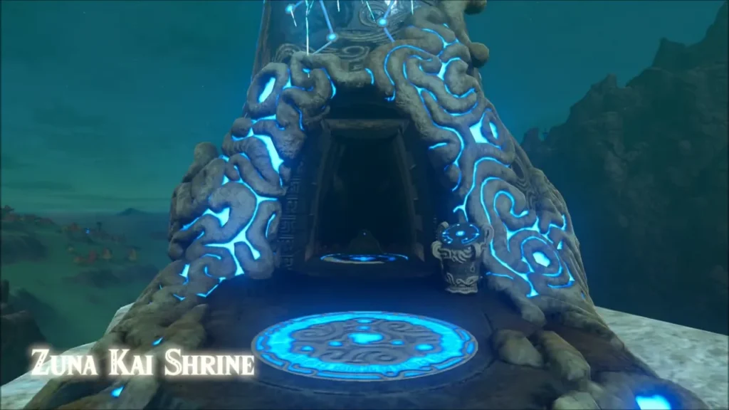 Link standing at the Zuna Kai Shrine entrance above the dark cliffs Link standing at the Zuna Kai Shrine entrance above the dark cliffs
