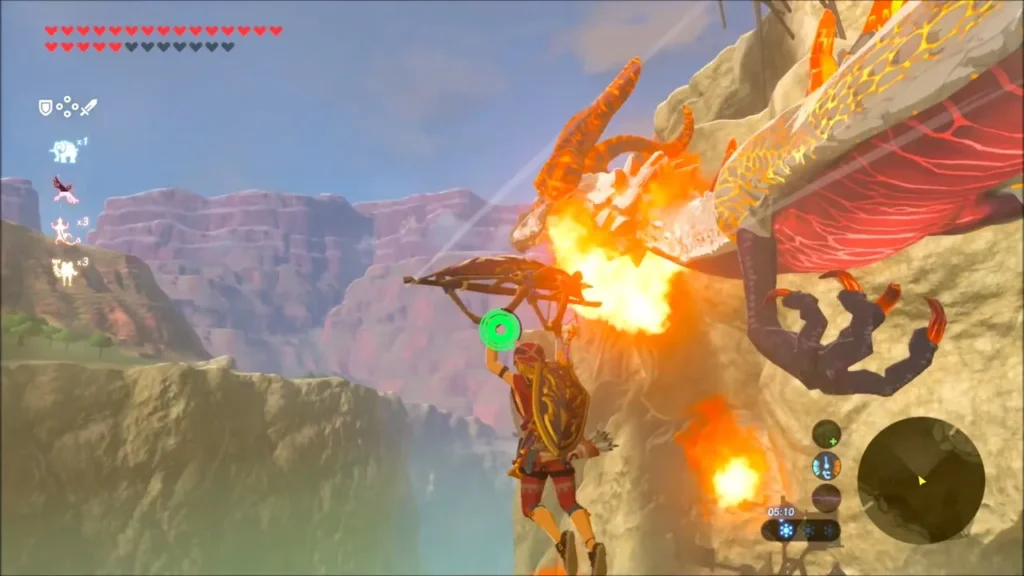 Link gliding beside Dinraal's burning horned head against the cliff Link gliding beside Dinraal's burning horned head against the cliff