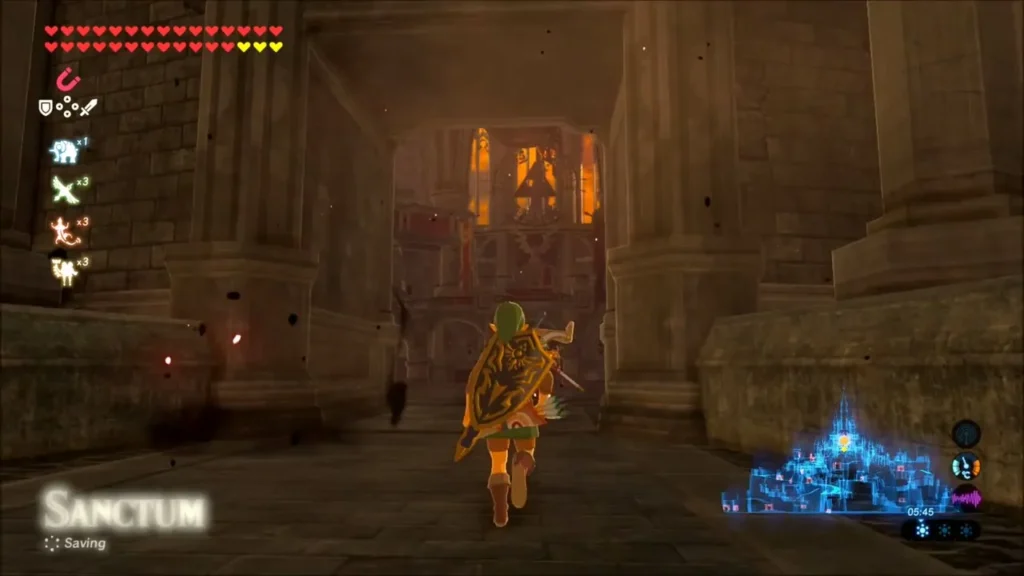 Link running down a dark stone corridor toward the Sanctum Link running down a dark stone corridor toward the Sanctum