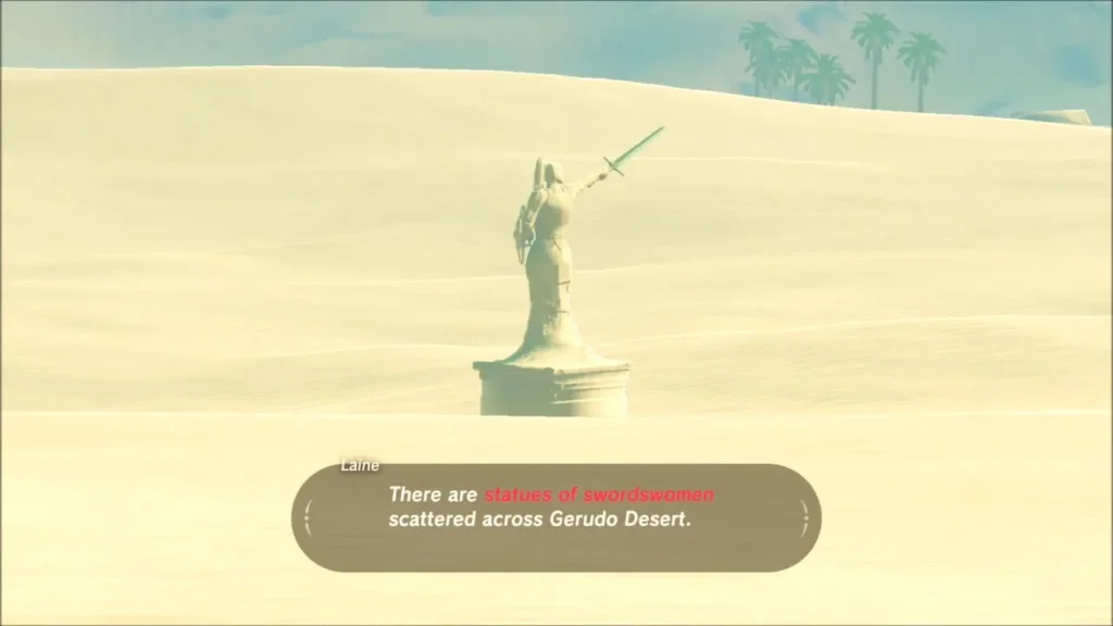 Stone swordswoman statue raising a sword on the Gerudo Desert dunes Stone swordswoman statue raising a sword on the Gerudo Desert dunes