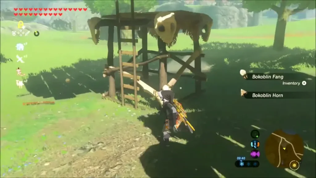 Link collecting a Bokoblin Fang and Horn beside a wooden watchtower Link collecting a Bokoblin Fang and Horn beside a wooden watchtower