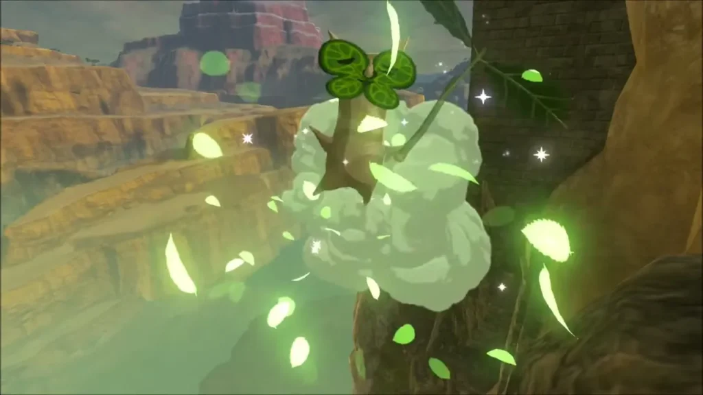A Korok bursting out in green leaves against a red canyon wall, giving up its seed A Korok bursting out in green leaves against a red canyon wall, giving up its seed