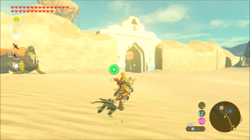 Link sprinting across the sand toward the arched gate of Gerudo Town Link sprinting across the sand toward the arched gate of Gerudo Town