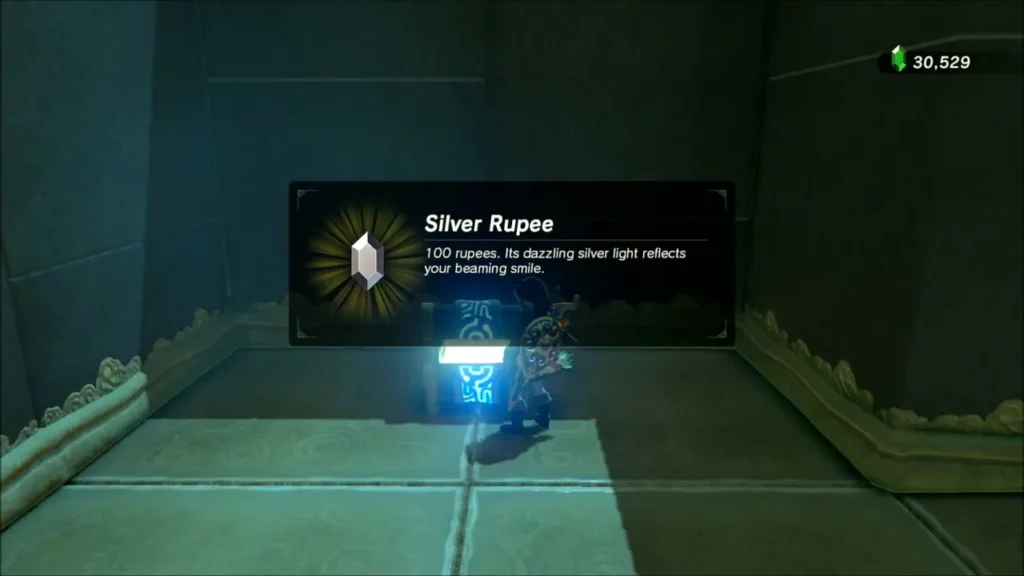 Link opening a chest and receiving a Silver Rupee Link opening a chest and receiving a Silver Rupee