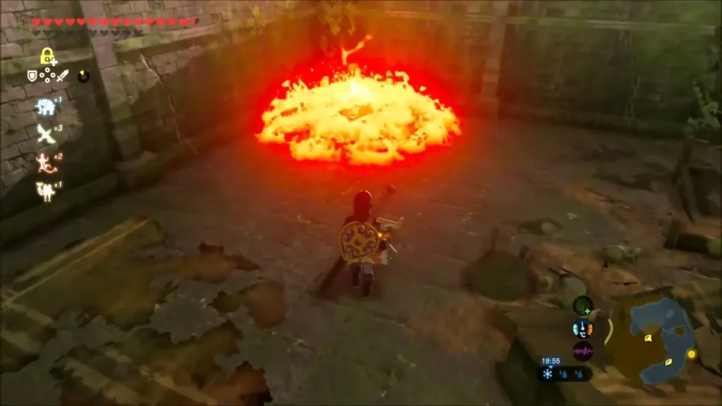 The pile of leaves burning against the stone wall The pile of leaves burning against the stone wall
