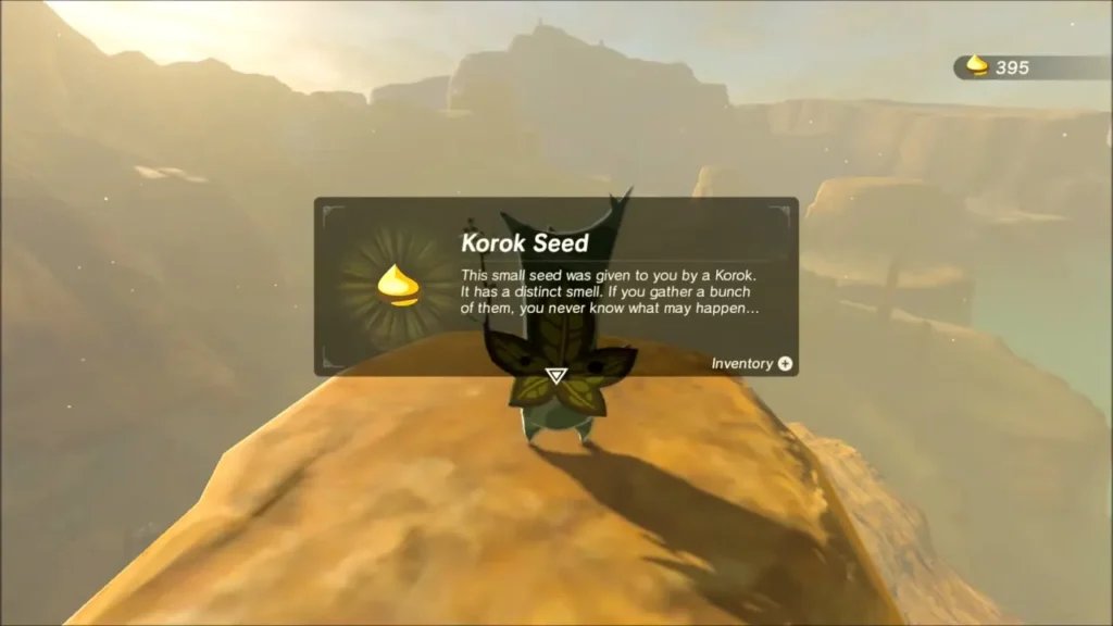 Korok on top of the rock pinnacle handing over a Korok Seed above the sand Korok on top of the rock pinnacle handing over a Korok Seed above the sand