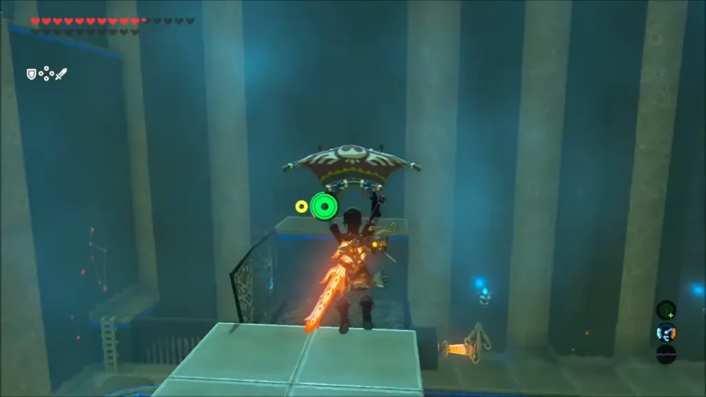 Link gliding across the shrine toward the far ledge Link gliding across the shrine toward the far ledge