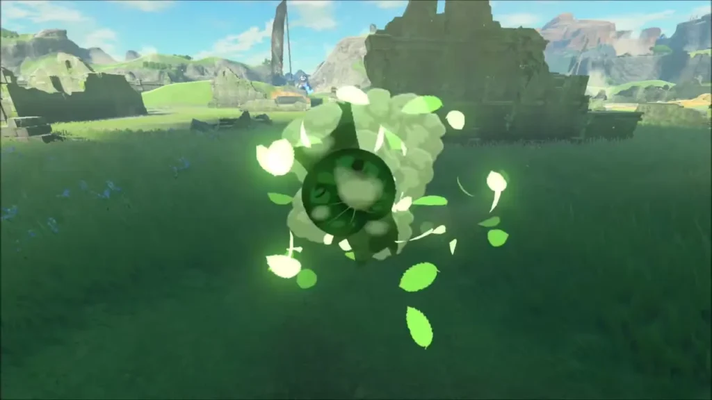 A Korok appearing in a burst of leaves in front of the ruined wall A Korok appearing in a burst of leaves in front of the ruined wall