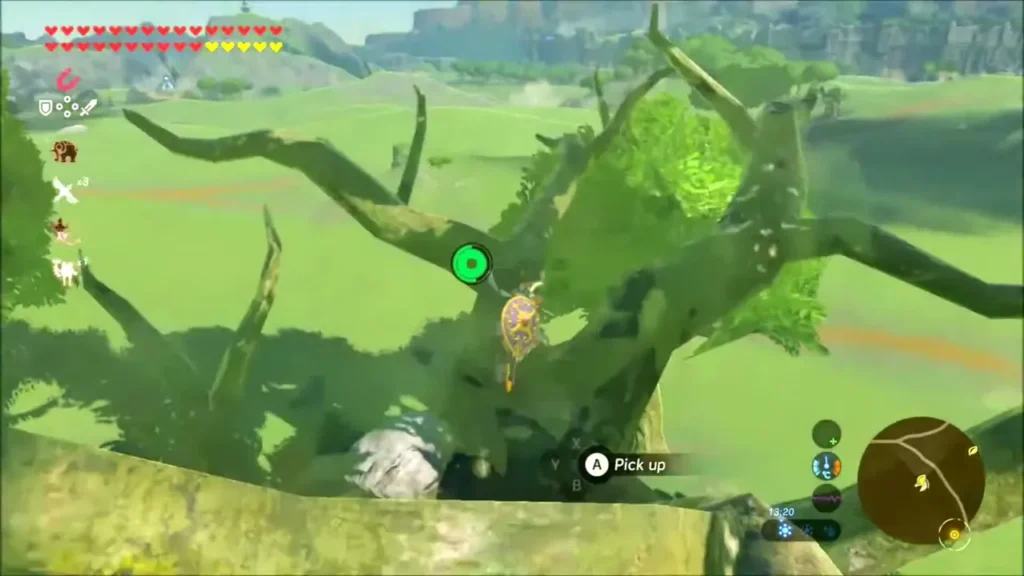 Link in a tree beside a stone lying in the branches, Pick up prompt Link in a tree beside a stone lying in the branches, Pick up prompt
