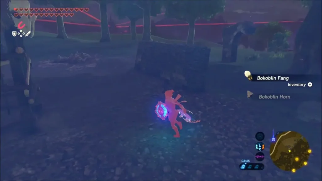 Link at the camp collecting a Bokoblin Fang after the fight Link at the camp collecting a Bokoblin Fang after the fight