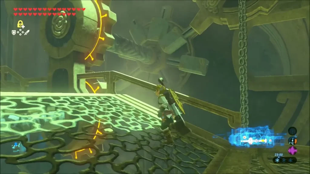 Link on a grated walkway beside a hanging chain and large gears Link on a grated walkway beside a hanging chain and large gears
