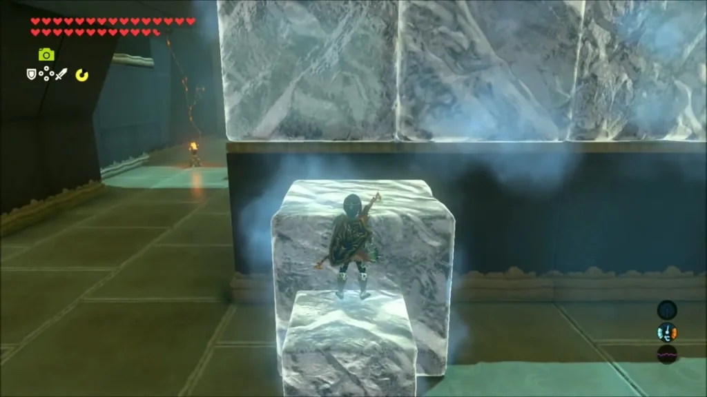 Link standing atop a thawed ice block below a ledge Link standing atop a thawed ice block below a ledge