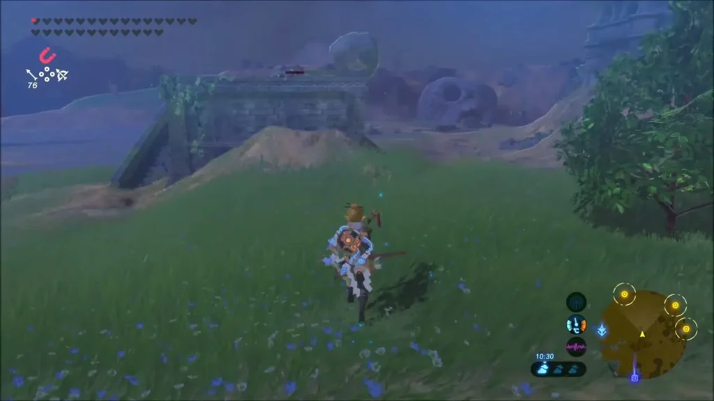 Link crossing a grassy hill toward the ruined Eastern Abbey at dusk Link crossing a grassy hill toward the ruined Eastern Abbey at dusk