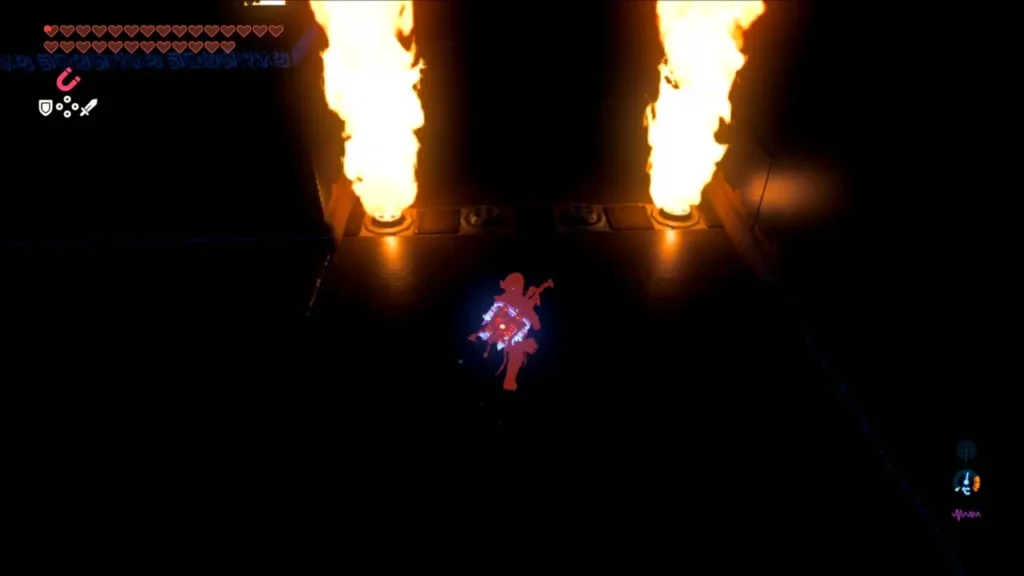 Link walking between two roaring flame pillars in the dark Link walking between two roaring flame pillars in the dark