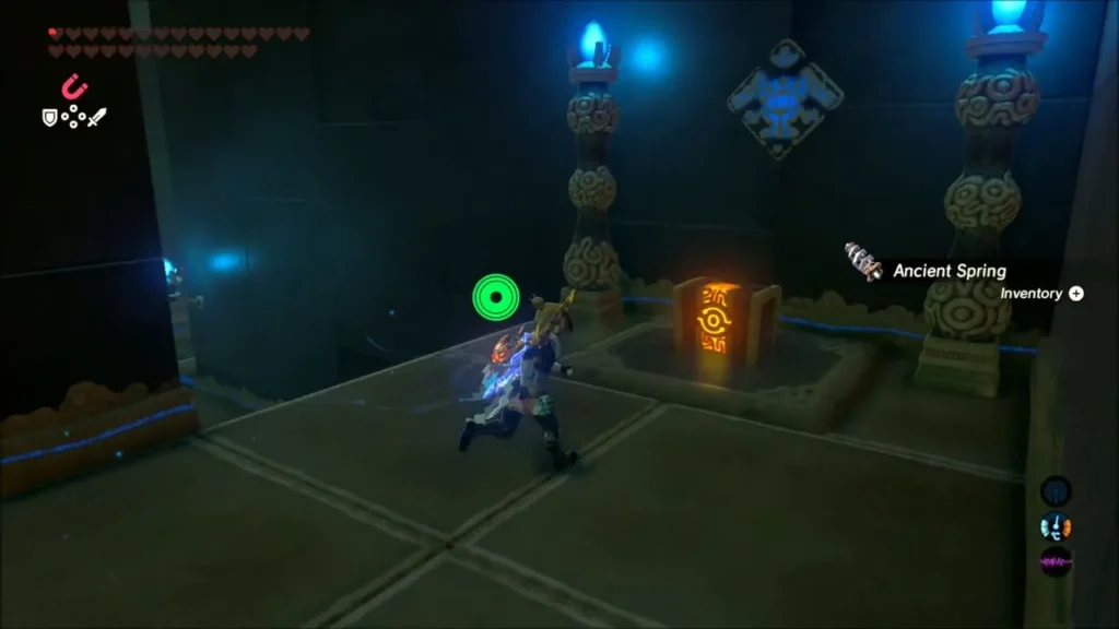 Link running toward a glowing orange chest in a pillared shrine room Link running toward a glowing orange chest in a pillared shrine room