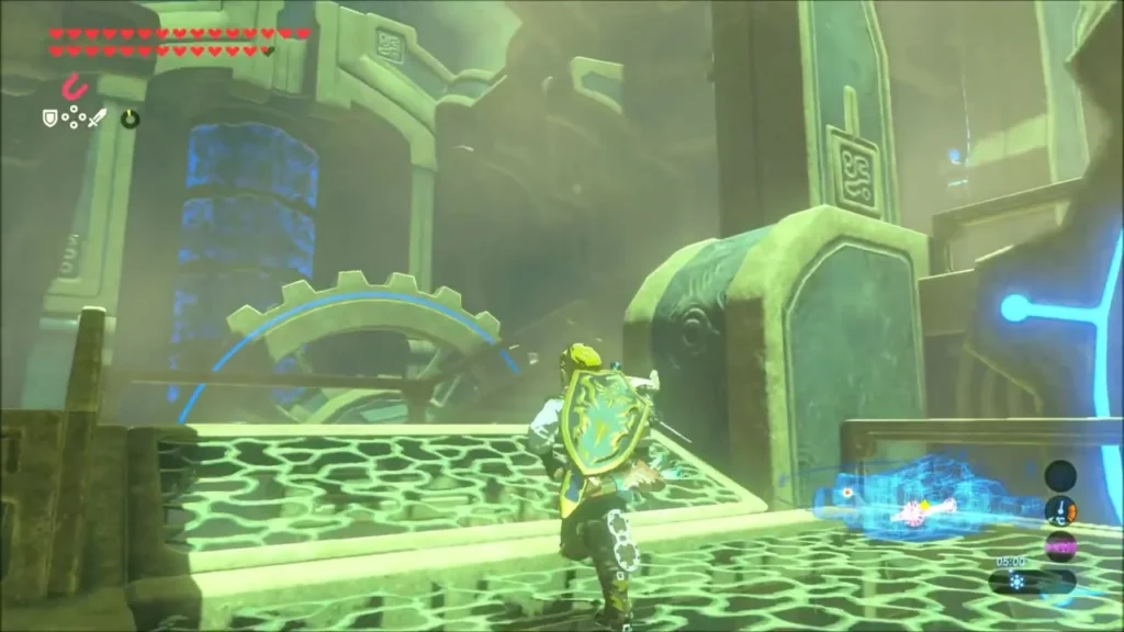 Link running along a lit path past a gear mechanism Link running along a lit path past a gear mechanism