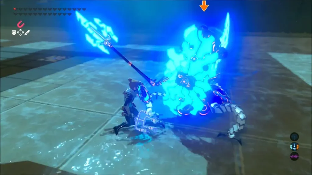 Link fighting a Guardian with a glowing blue shield and spear Link fighting a Guardian with a glowing blue shield and spear