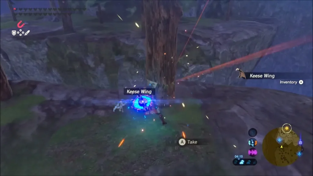 Link picking up a Keese Wing on a grassy ledge among trees Link picking up a Keese Wing on a grassy ledge among trees