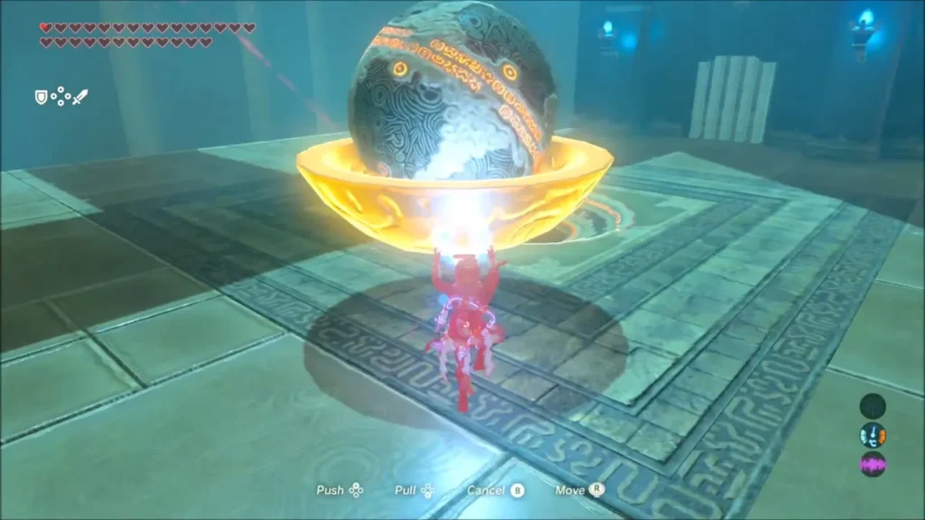 Link carrying a large orb in the bowl with Magnesis Link carrying a large orb in the bowl with Magnesis
