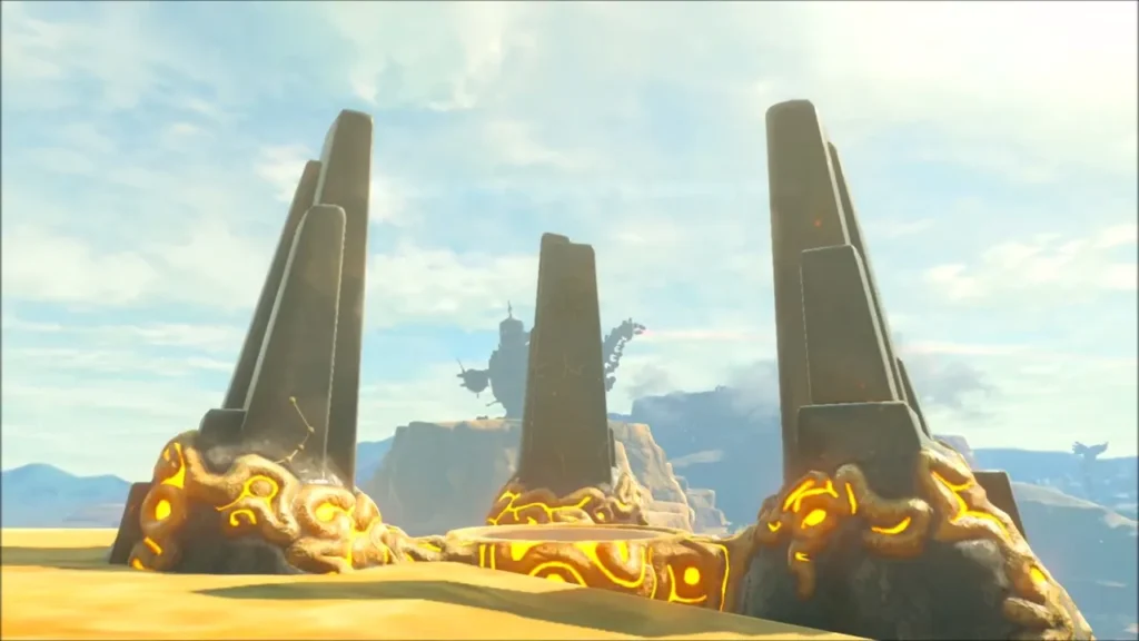 Three stone obelisks of the trial monument on the mesa with Vah Naboris behind Three stone obelisks of the trial monument on the mesa with Vah Naboris behind