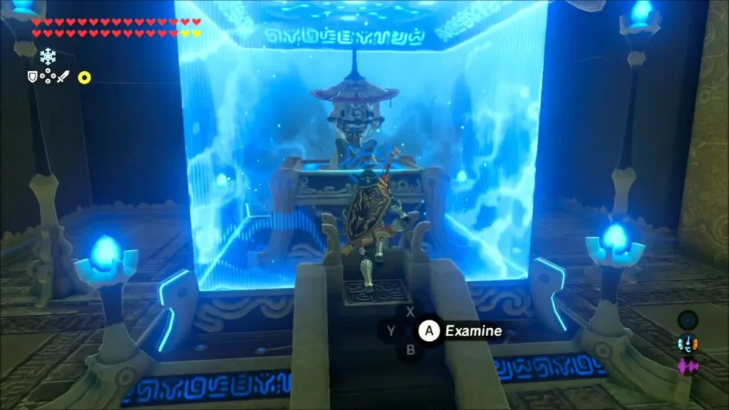 Link at the open gate facing the monk for Ruta's Emblem Link at the open gate facing the monk for Ruta's Emblem