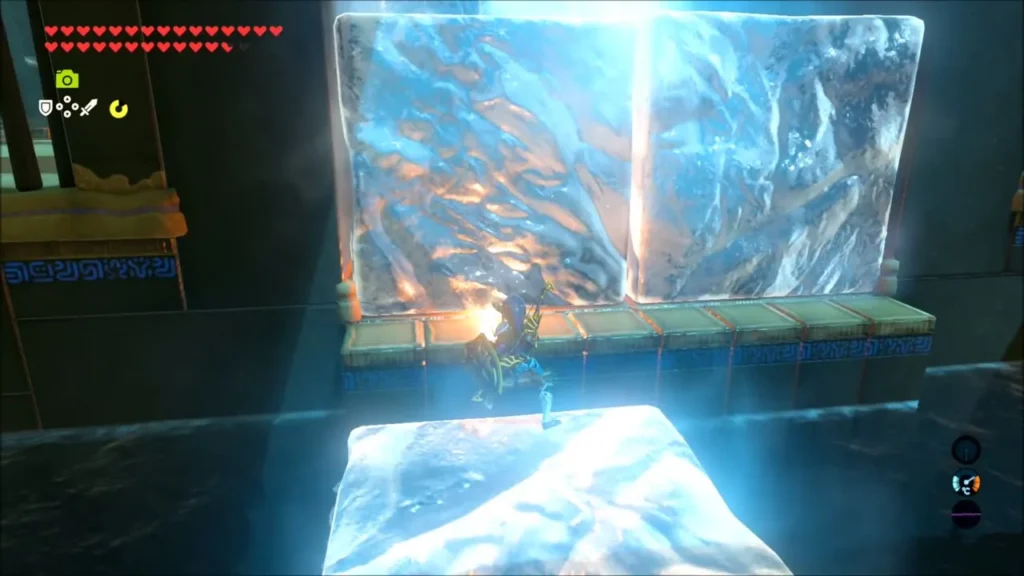 Link holding a torch against a large ice block with a thawed slab before him Link holding a torch against a large ice block with a thawed slab before him