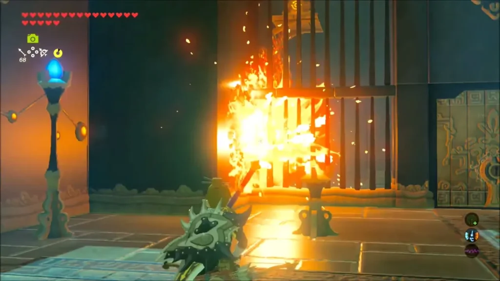 A wooden barred gate blazing with fire in the shrine A wooden barred gate blazing with fire in the shrine