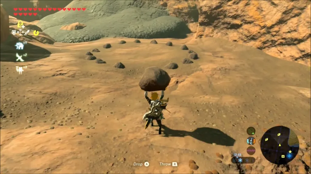 Link carrying a boulder toward a ring of small rocks in the dirt Link carrying a boulder toward a ring of small rocks in the dirt