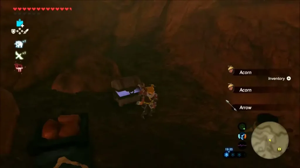 Link opening a chest inside a dark cave Link opening a chest inside a dark cave