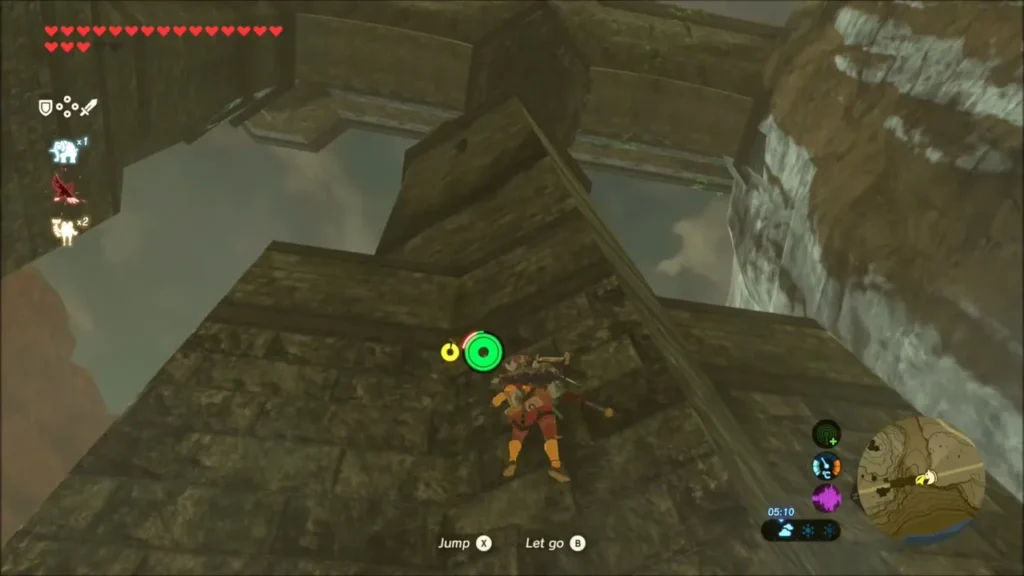 Link in climbing gear scaling the ruined stone wall Link in climbing gear scaling the ruined stone wall