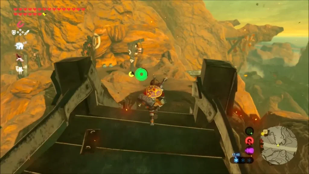 Link climbing a wooden scaffolding on the lava-lit slope toward the Goron Hot Springs Link climbing a wooden scaffolding on the lava-lit slope toward the Goron Hot Springs