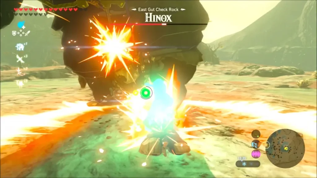 Link striking the Hinox in a burst of fire and light Link striking the Hinox in a burst of fire and light