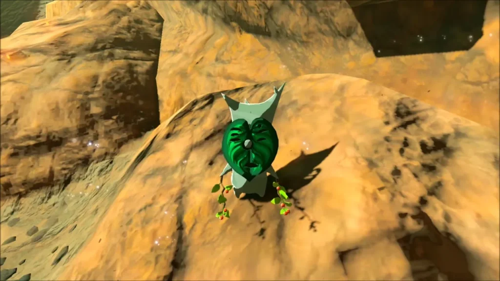 A Korok appearing on a rocky ledge after the puzzle A Korok appearing on a rocky ledge after the puzzle