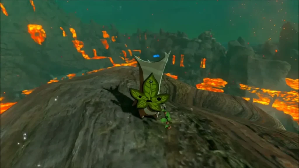 A Korok showing itself on the rock peak with lava fields behind A Korok showing itself on the rock peak with lava fields behind