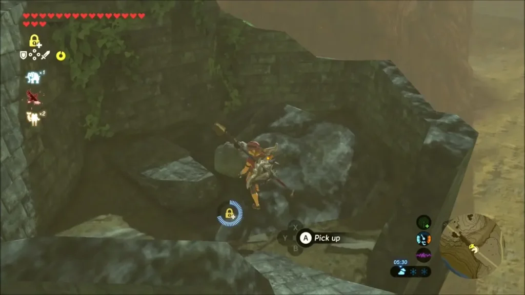 Link about to pick up a rock on the ledge Link about to pick up a rock on the ledge