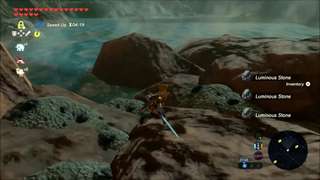 Link on dark rocks above the water after collecting several Luminous Stones Link on dark rocks above the water after collecting several Luminous Stones