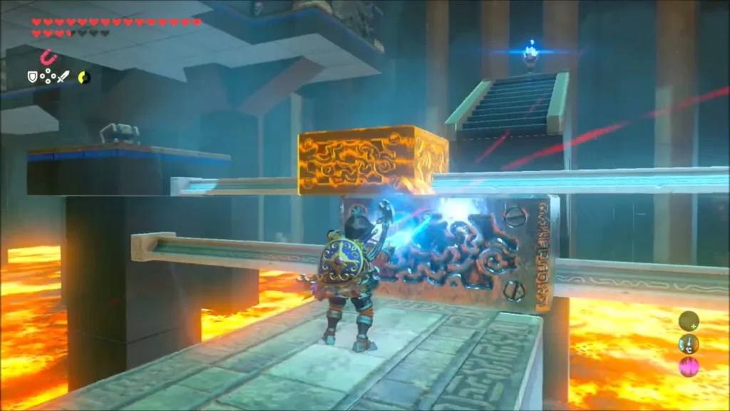 Link using Magnesis to line up a metal platform over lava in Shora Hah Shrine Link using Magnesis to line up a metal platform over lava in Shora Hah Shrine