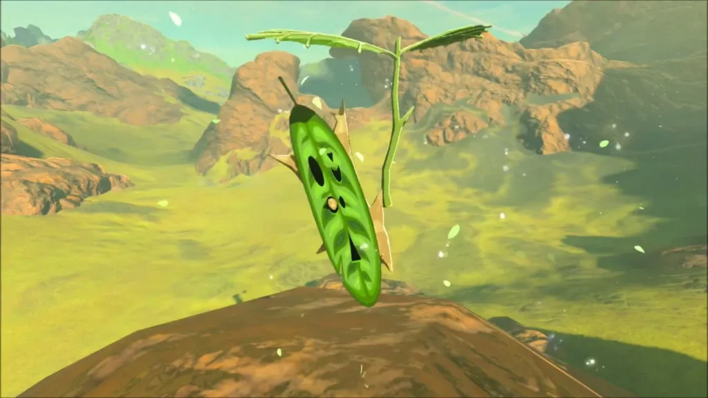 A Korok popping out on top of the mound over the valley A Korok popping out on top of the mound over the valley