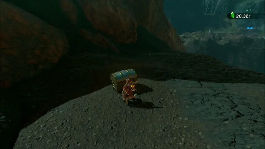 Link opening a chest at the end of the dark cave Link opening a chest at the end of the dark cave