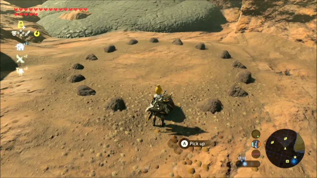 Ring of small rocks on bare ground with Link standing in the middle Ring of small rocks on bare ground with Link standing in the middle