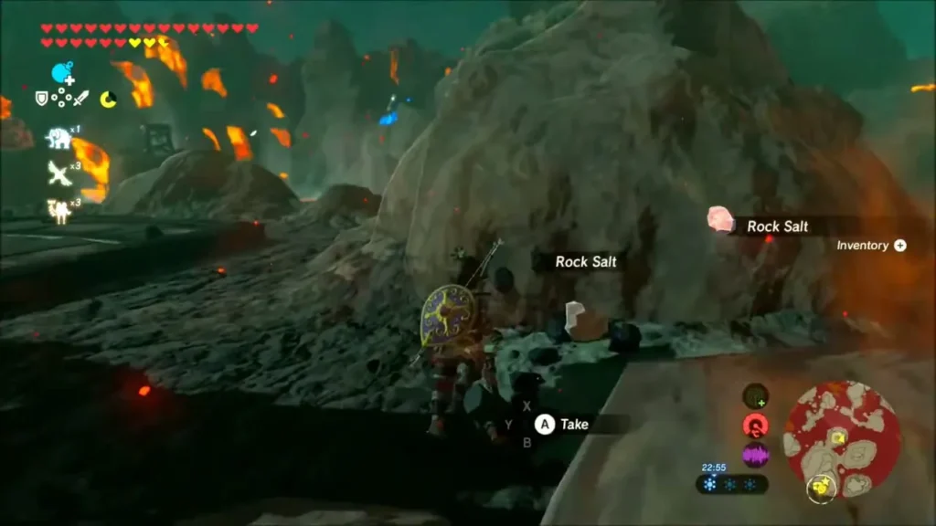 Link picking up Rock Salt on a ledge beside the lava Link picking up Rock Salt on a ledge beside the lava