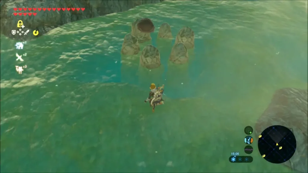 A boulder sitting on one of the stone pillars in the water as Link wades nearby A boulder sitting on one of the stone pillars in the water as Link wades nearby