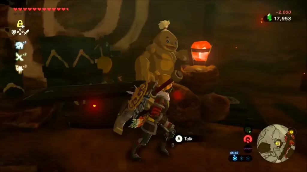 Link talking to Rogaro at his armor shop counter in Goron City Link talking to Rogaro at his armor shop counter in Goron City