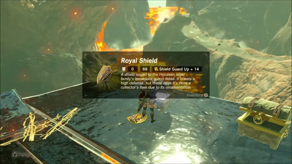 Link holding up the Royal Shield from a chest on a metal deck Link holding up the Royal Shield from a chest on a metal deck