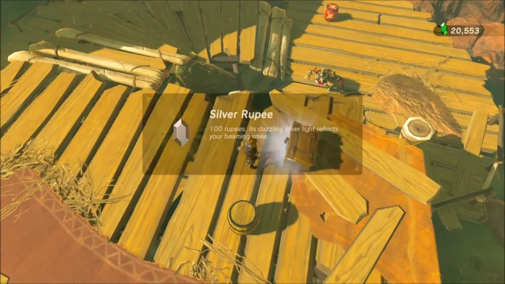 Link picking up a Silver Rupee from a chest on a wooden deck Link picking up a Silver Rupee from a chest on a wooden deck
