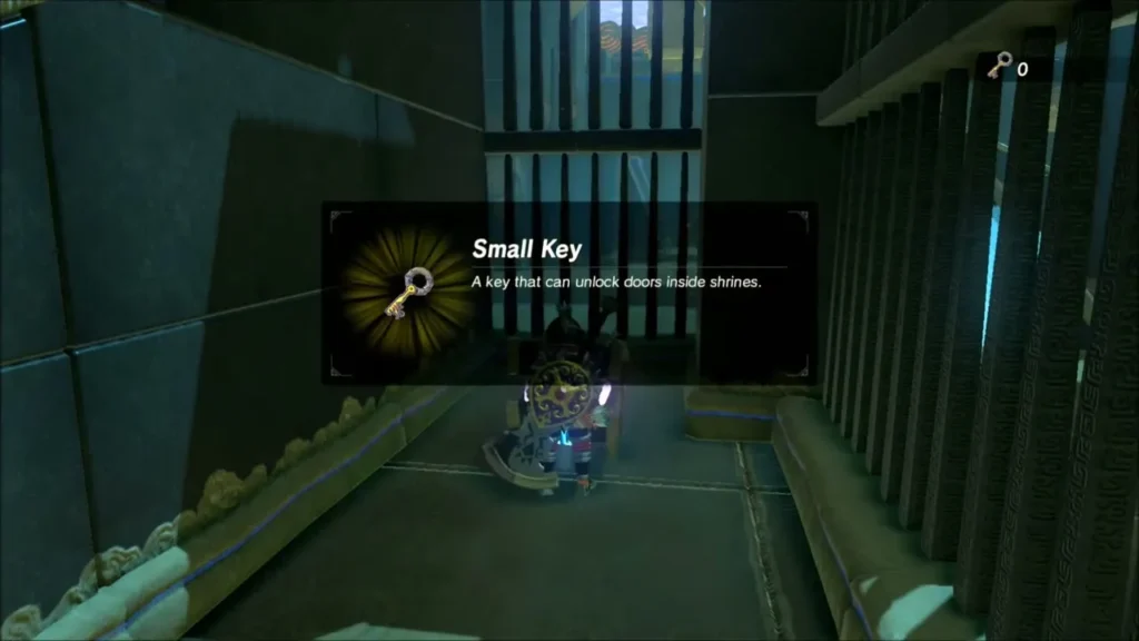 Link holding up a Small Key in Shae Mo'sah Shrine Link holding up a Small Key in Shae Mo'sah Shrine