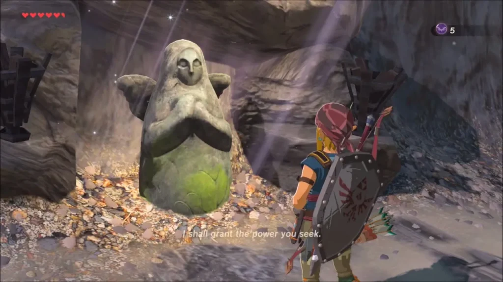 Link praying before the Goddess Statue in the beach cave