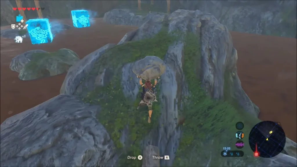 Link carrying a boulder up the mossy rock spire in the dry hollow