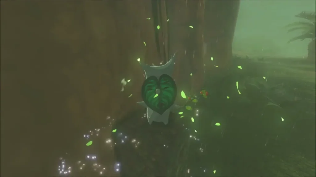A Korok appearing in a burst of leaves beside the stone post
