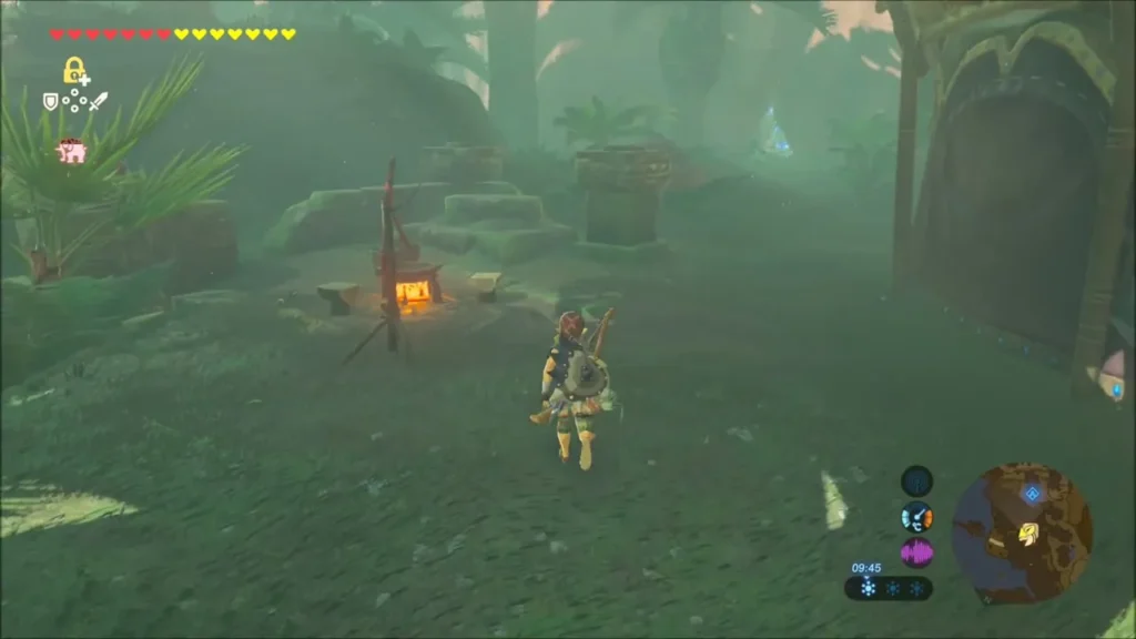 Link walking toward an unlit campfire cooking spot near the stable